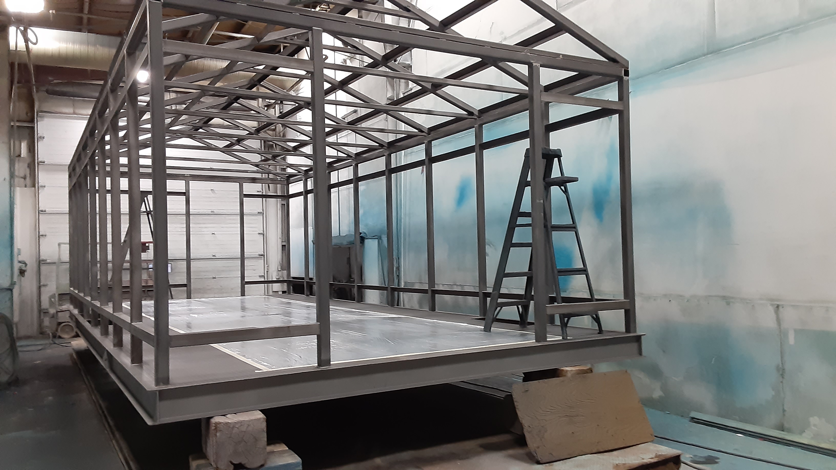 A steel building prepped and ready for top coating